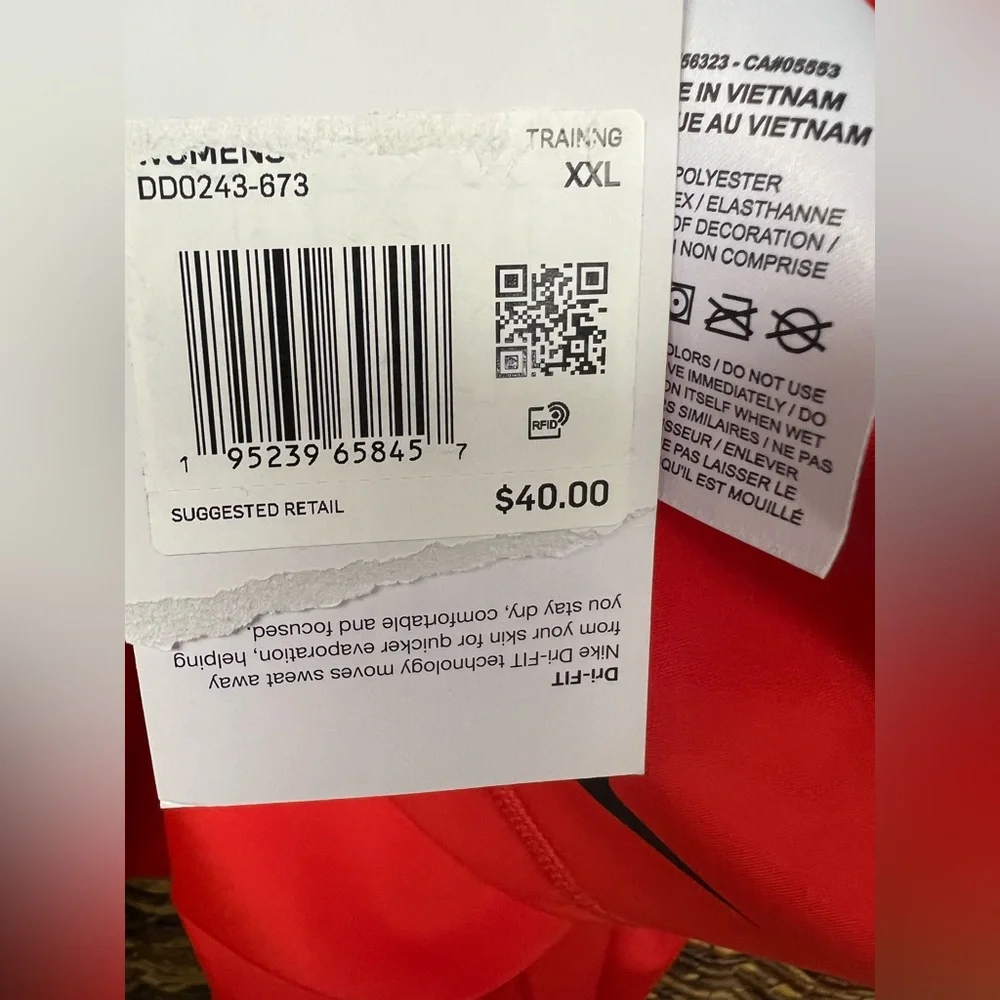 Nike Women's Red Shorts-XXL, tags, sun fade lines ( please see images).‎